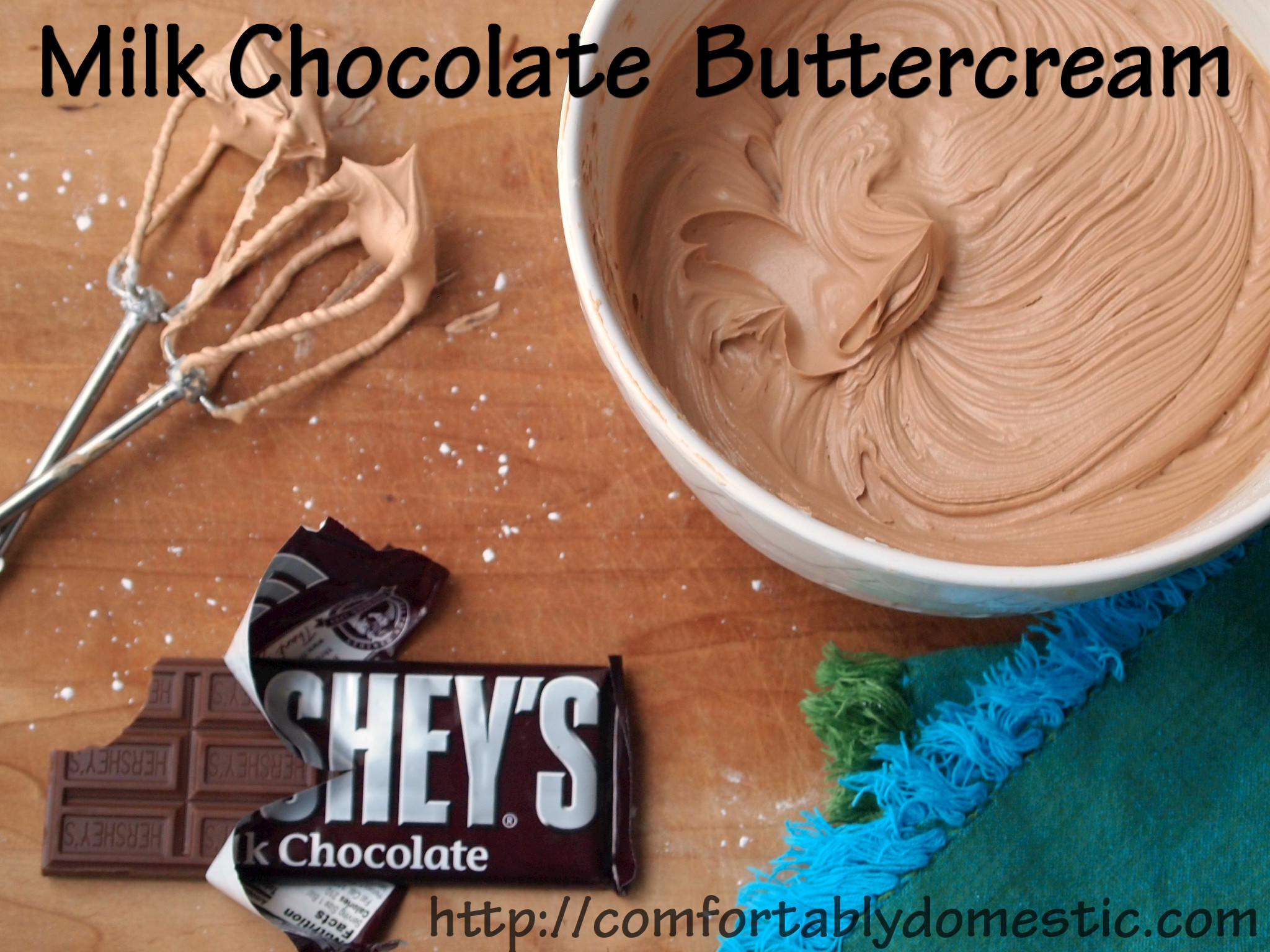 Milk Chocolate Buttercream Frosting Recipe - So good, you might want to eat it straight from the spoon! \\ Recipe on ComfortablyDomestic.com